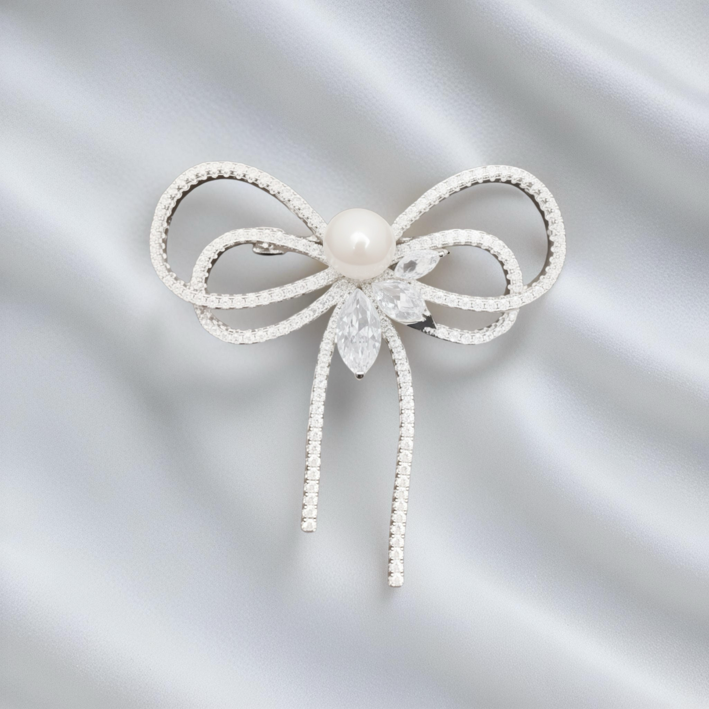 Broche gracieuse à double nœud en perles